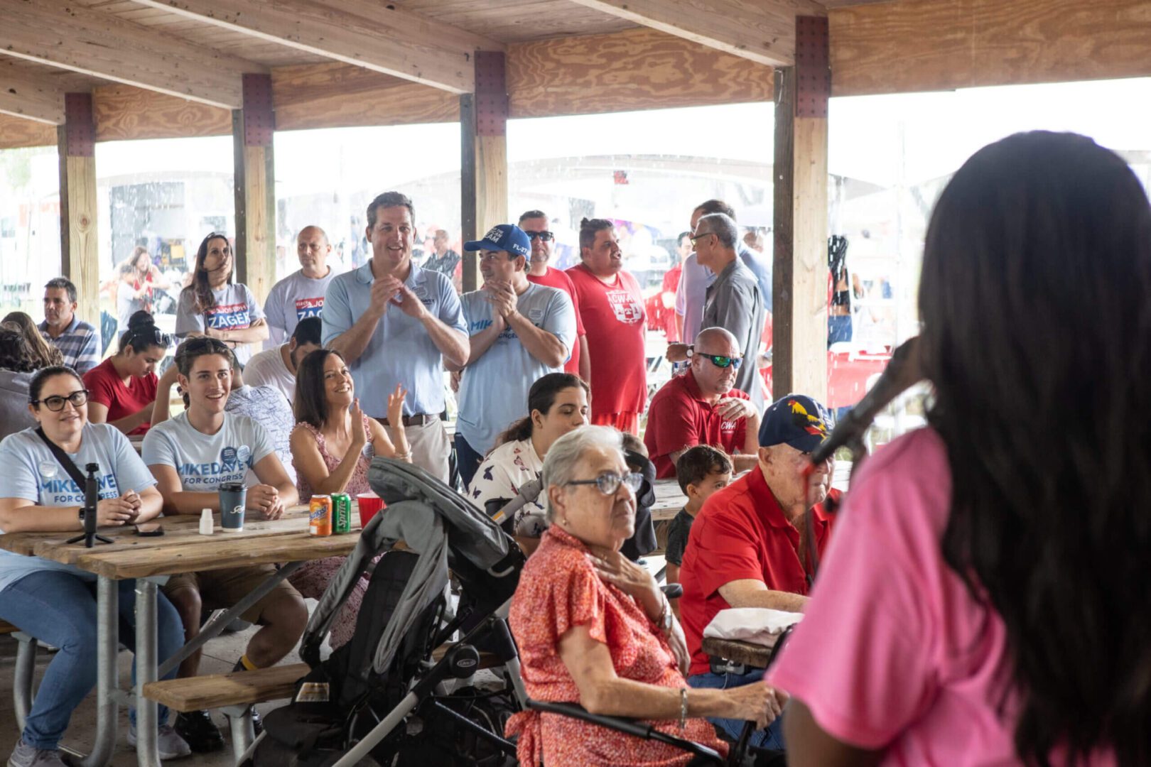 Group of people gathered at an outdoor event.